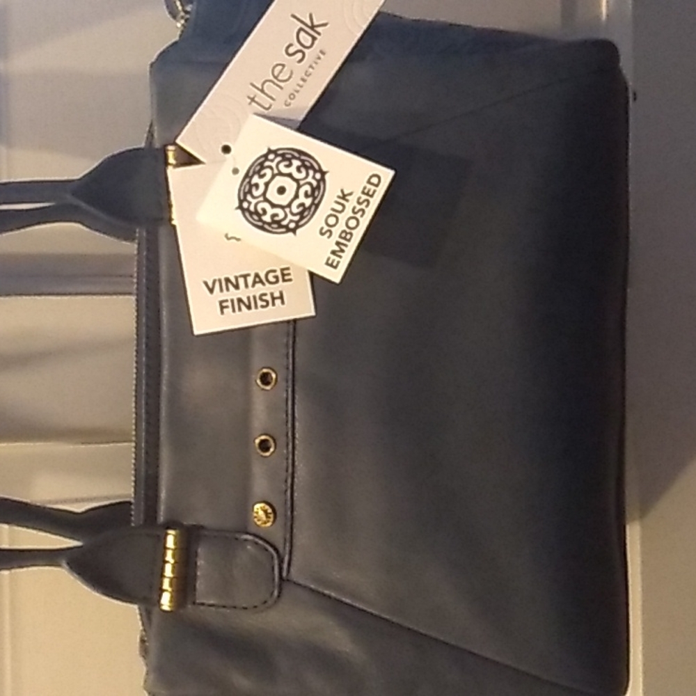 The Sak Souk embossed